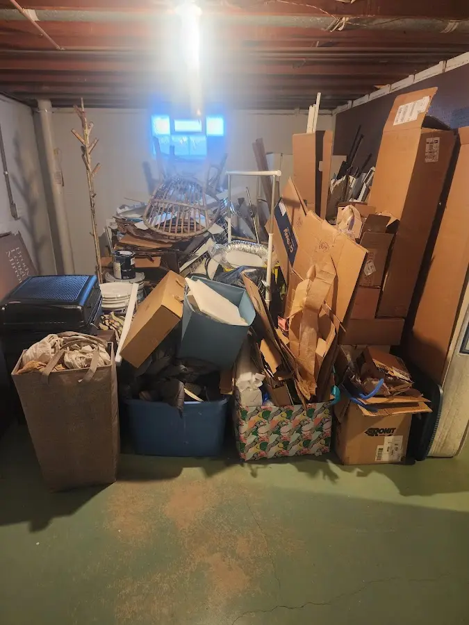 Roll-off dumpster container at job site for 20 Yard Dumpster Rental in Granite Shoals